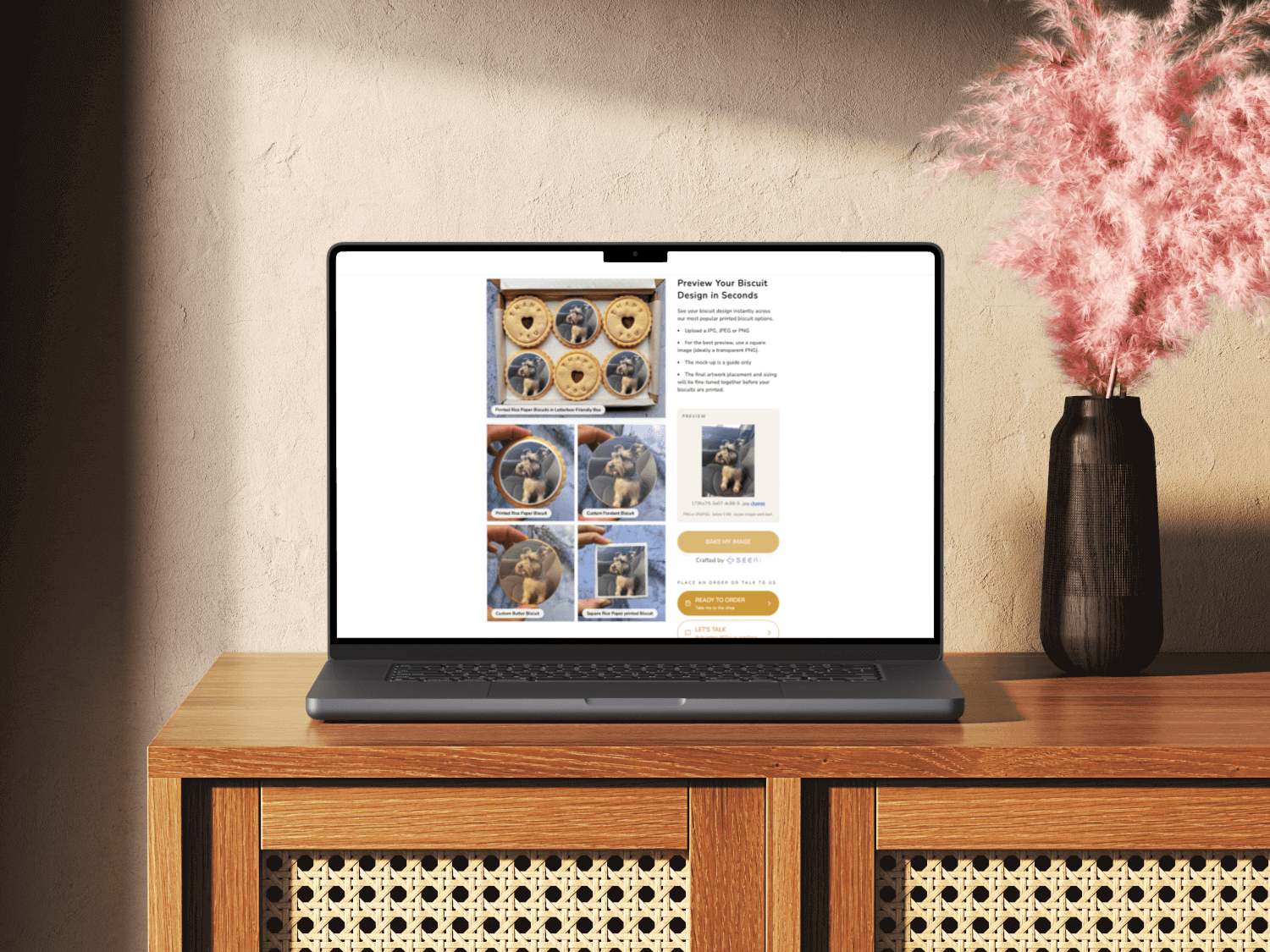 The Biskery custom biscuit platform on laptop